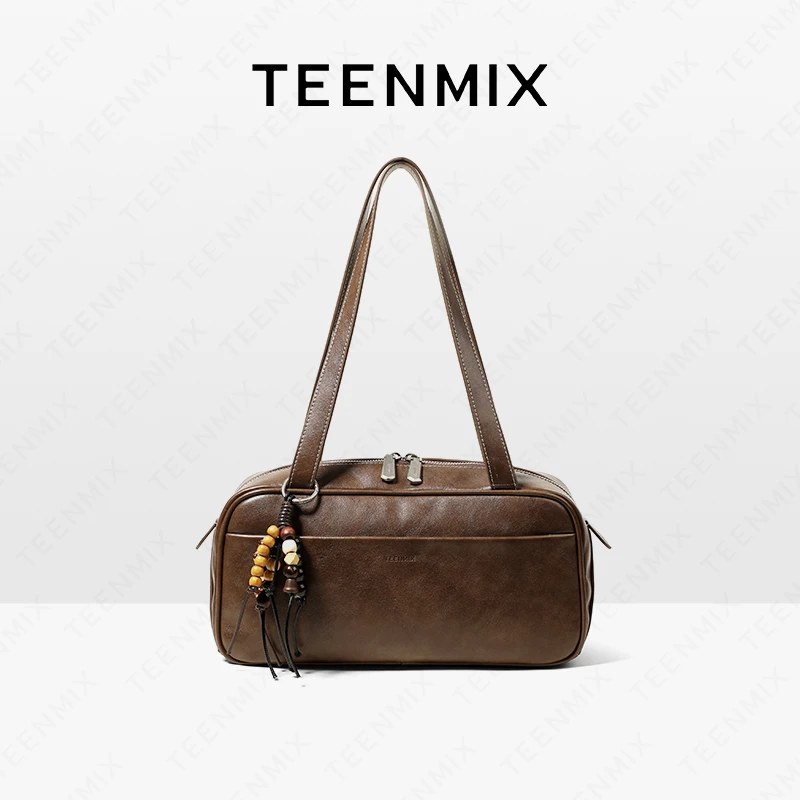 天美意女包2025新款流光风植鞣牛皮保龄球包手提单肩公文包托特包