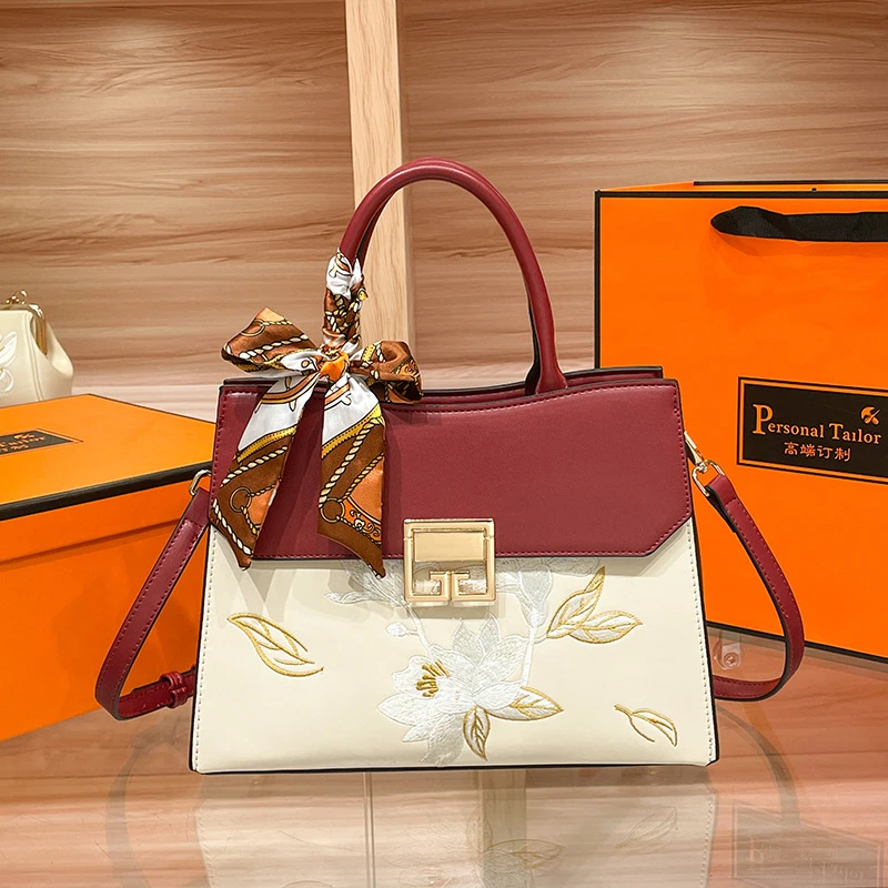 气质复古玫瑰袋鼠婚包手提包女皮包2025新款轻奢大气大容量刺绣包