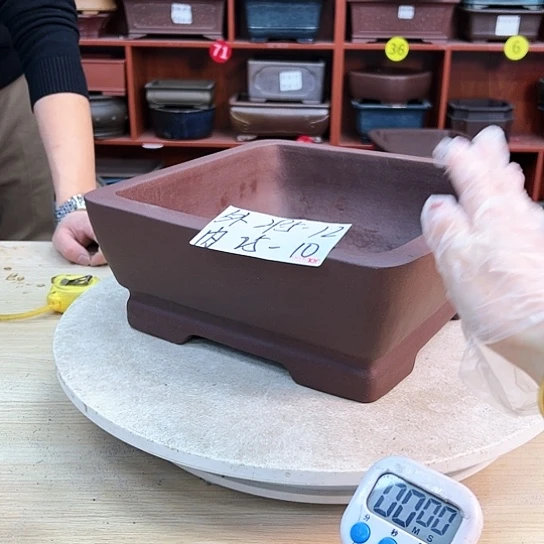 红陶遇****斥紫砂花盆的制作工艺