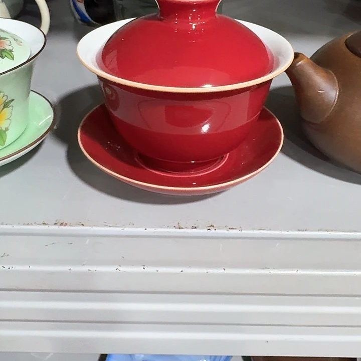 主人杯一个，瓷。。品茗