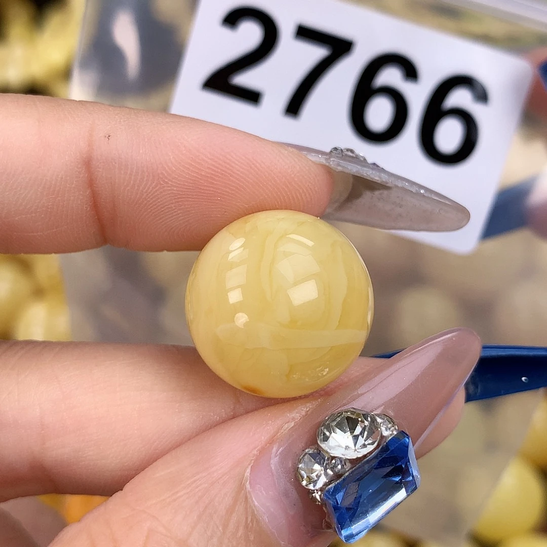 蜜蜡未镶嵌珠宝奇石18.8，沙眼