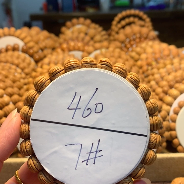 问***鼎手串桃核7#野生桃核