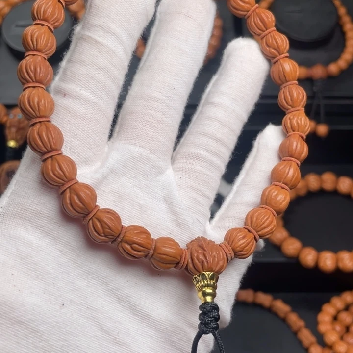 J***J木质类精品桃核手持