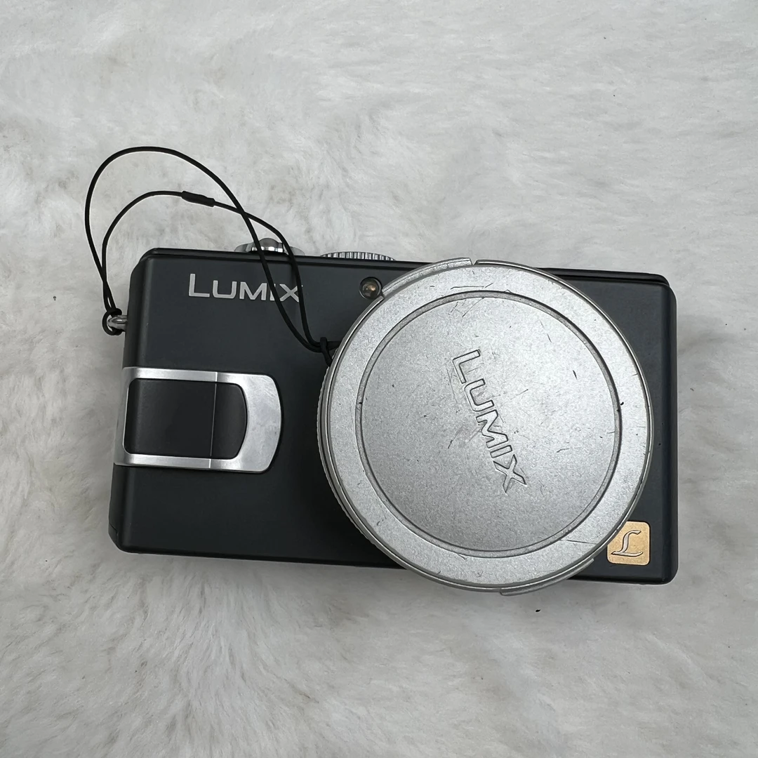 95新 Panasonic/松下 LX1灰色福利机 860w像素4倍光变冷白皮出片