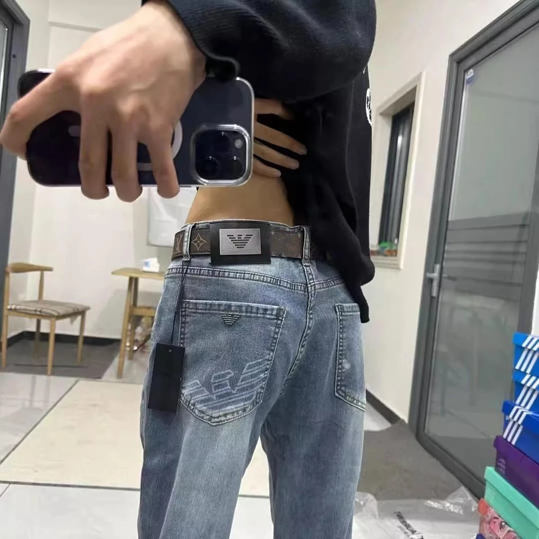 秋冬款印花老鹰牛仔裤男士潮牌网红同款直筒休闲小脚学生九分裤子