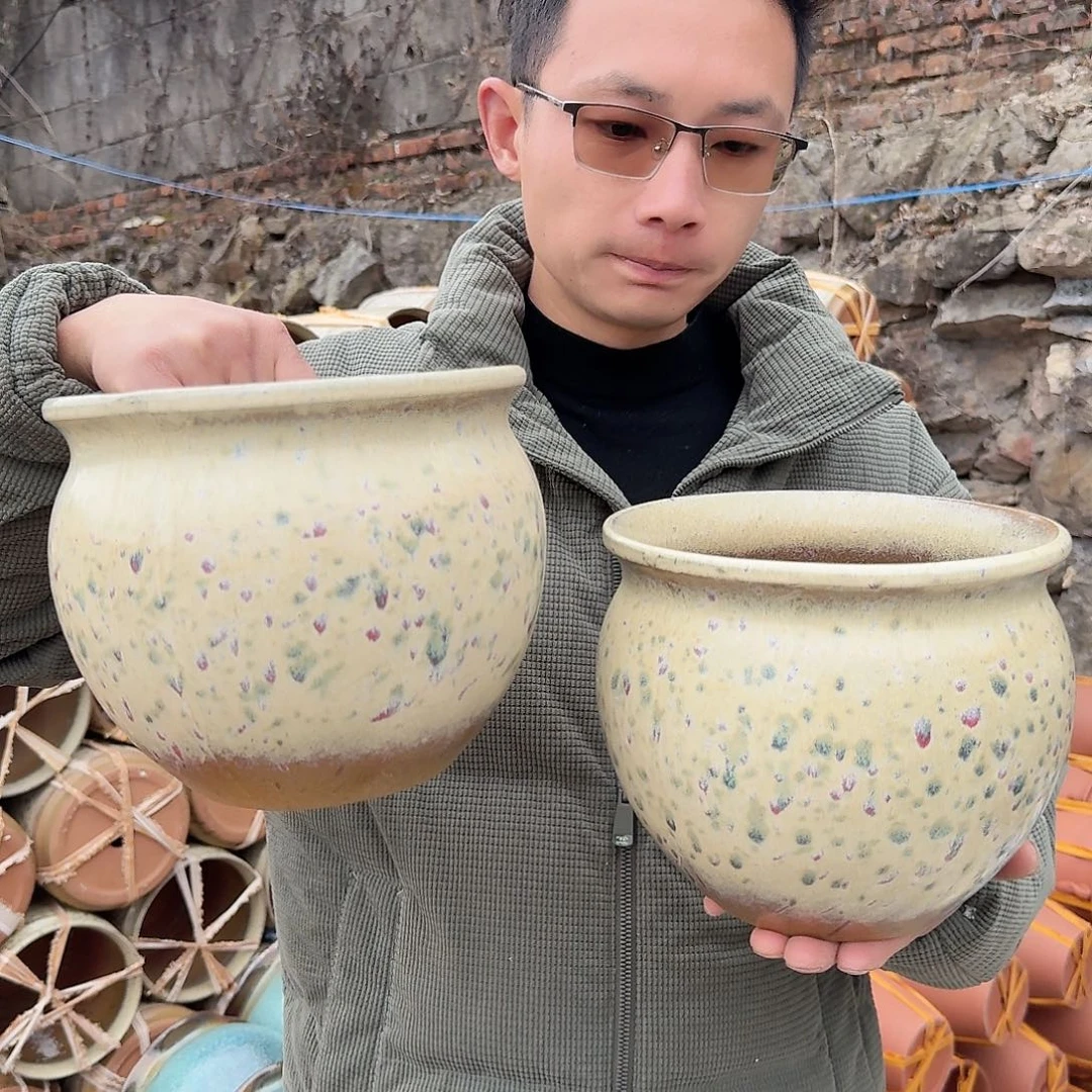 紫砂花盆口20高18（两个胖子彩色文林