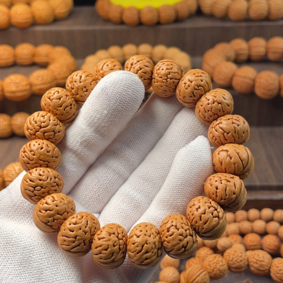 嘘***…吊坠桃核树王纽扣