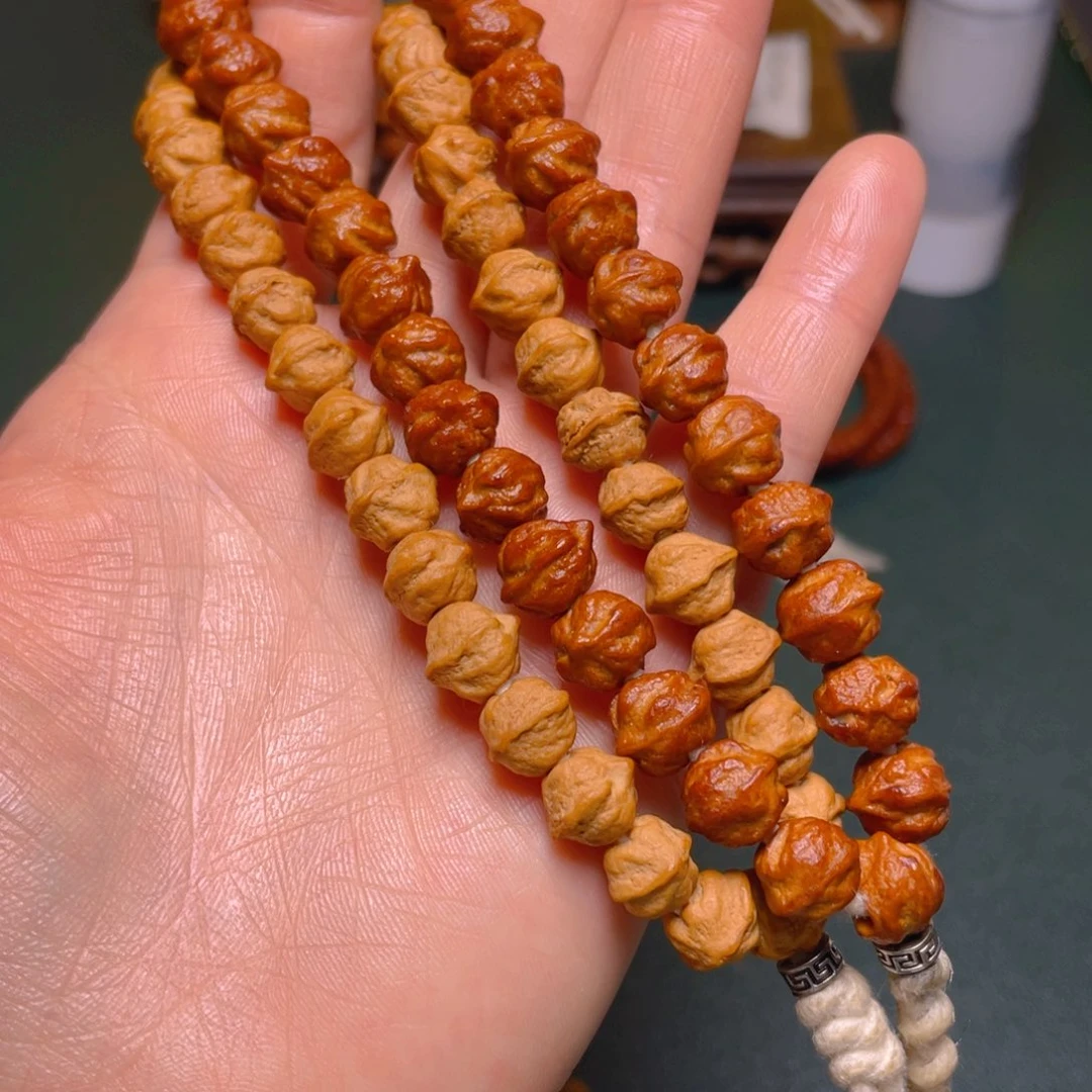 柏香籽/百香籽吊坠白牙横打手持