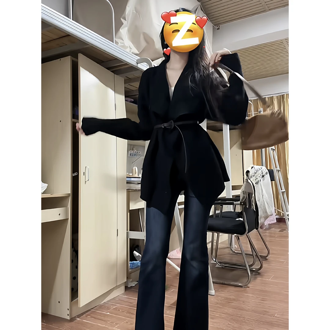 2025韩系感收腰中长款黑色毛衣外套女秋冬季不规则设计感针织开衫