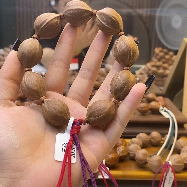 马***某橄榄核手串梅林铁核