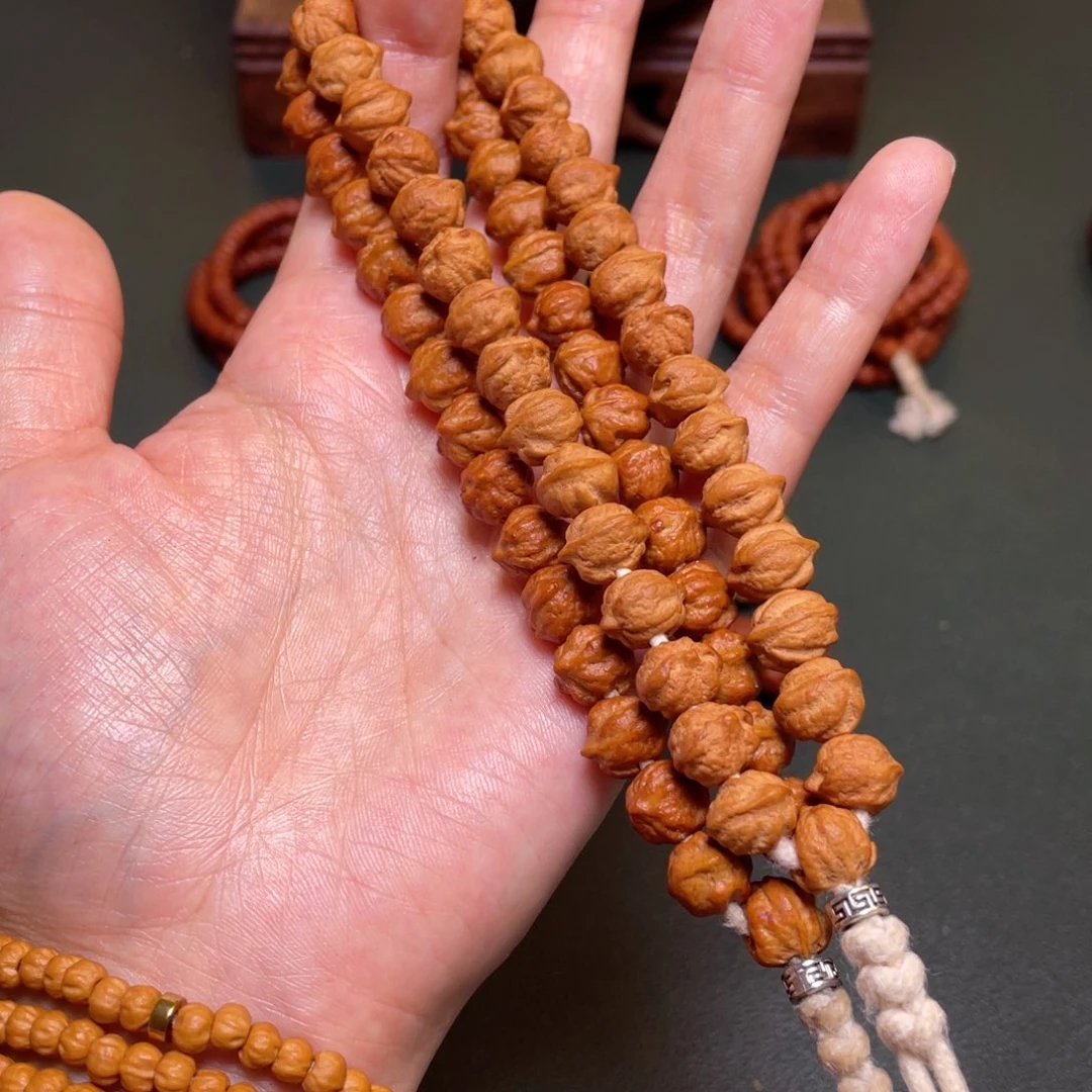 柏香籽/百香籽吊坠白牙横打手持