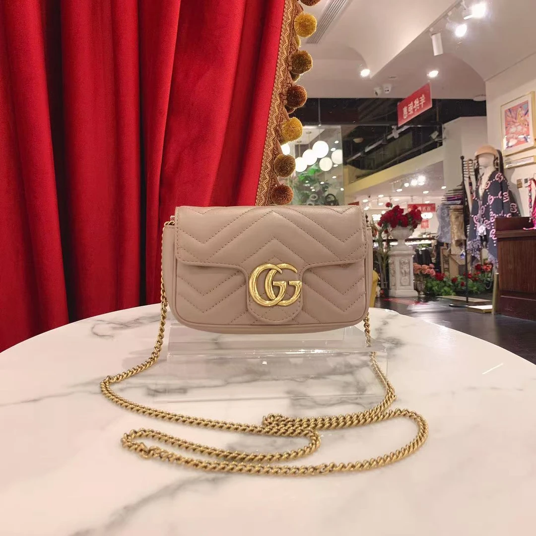 95新 GUCCI/古驰 GGS马蒙super mini奶茶色牛皮单肩包 31092217