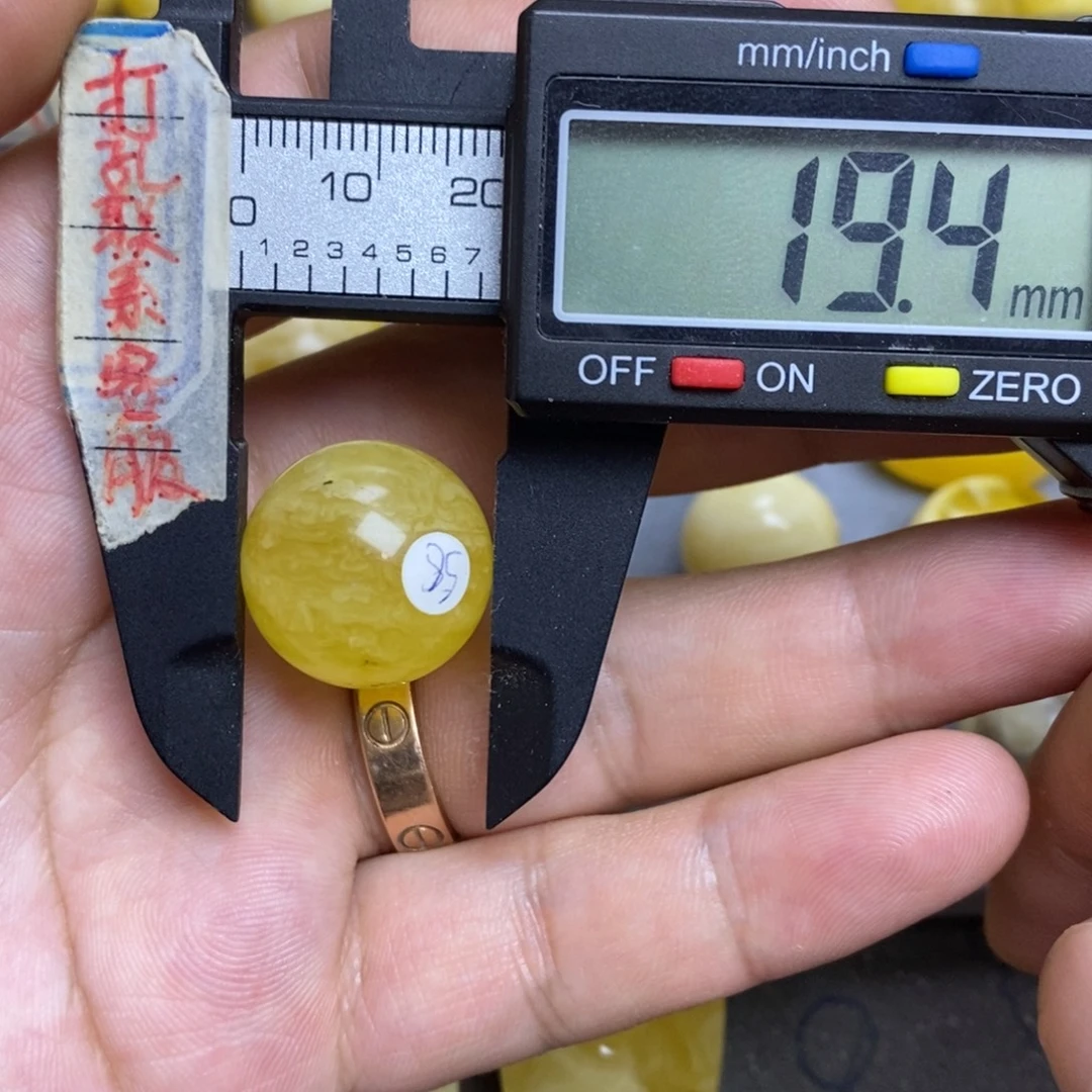 蜜蜡未镶嵌裸石19.4瑕疵圆珠默认直发