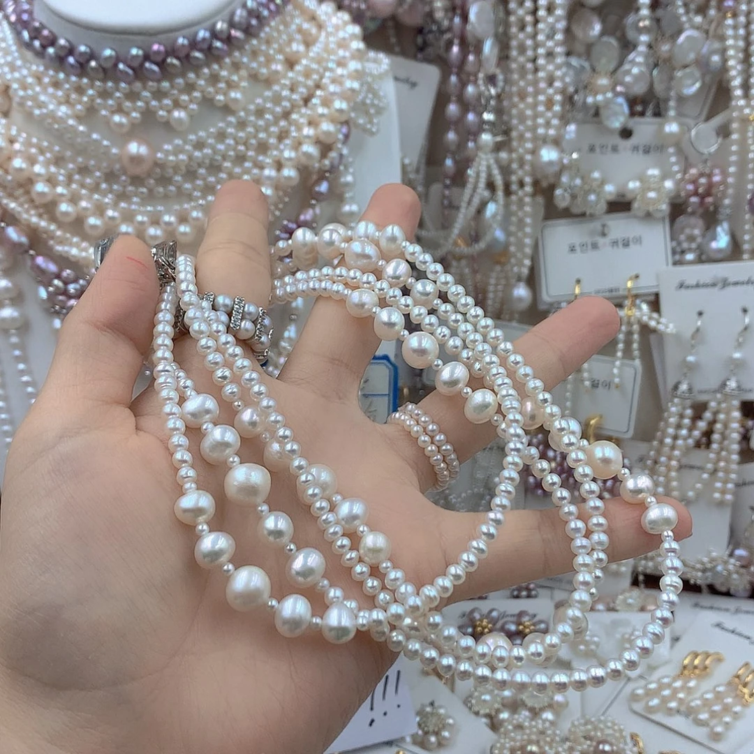 秃****耳饰银S925镶嵌淡水珍珠