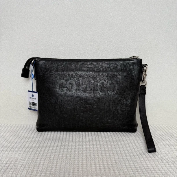 95新 GUCCI/古驰  7078/时尚休闲百搭黑色全皮压纹手拿包/可单肩