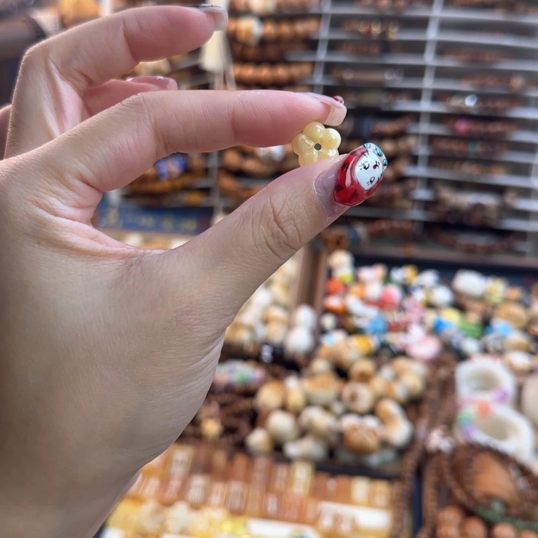 洛***。吊坠菩提根/象牙果花花差价