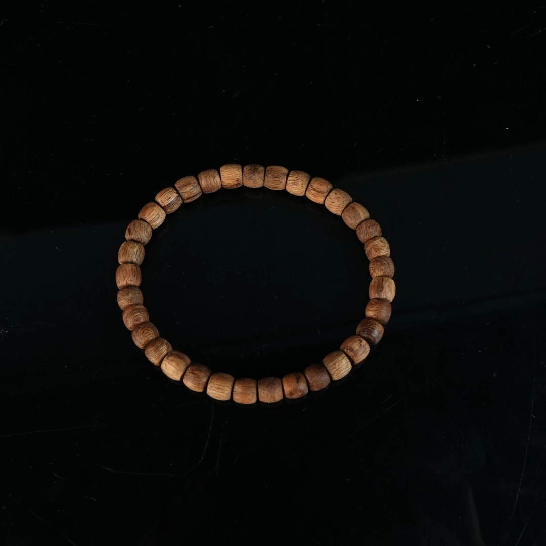 4207巴布亚沉香粗纹8分沉老型珠0.65x0.55cm 3.32g