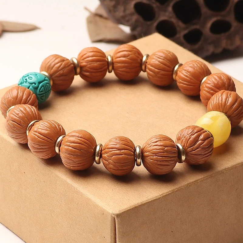 原皮野生凤羽猴头手串真品土豪桃核南瓜桩文玩菩提盘玩佛珠手1.5*