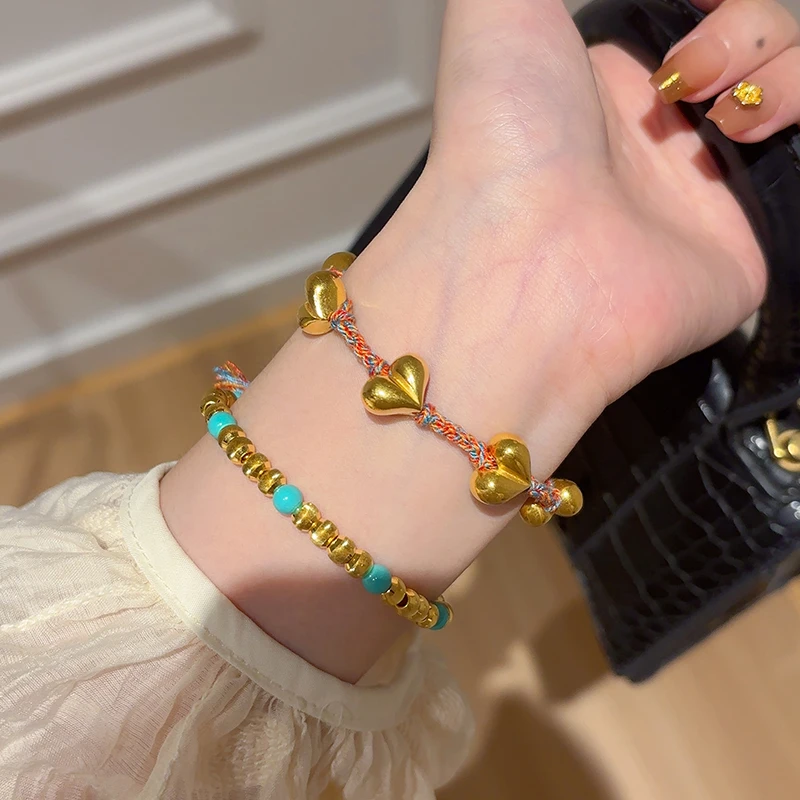 海上罗孚黄金屁桃编织手绳女999足金算盘珠红绳手链生日礼物