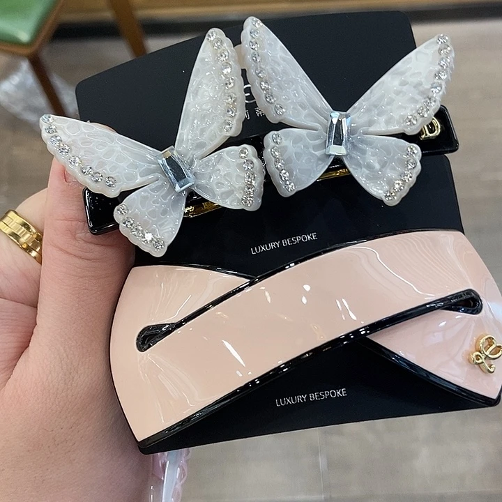 醋酸铜合金两个蝴蝶粉色飘带交叉弹夹