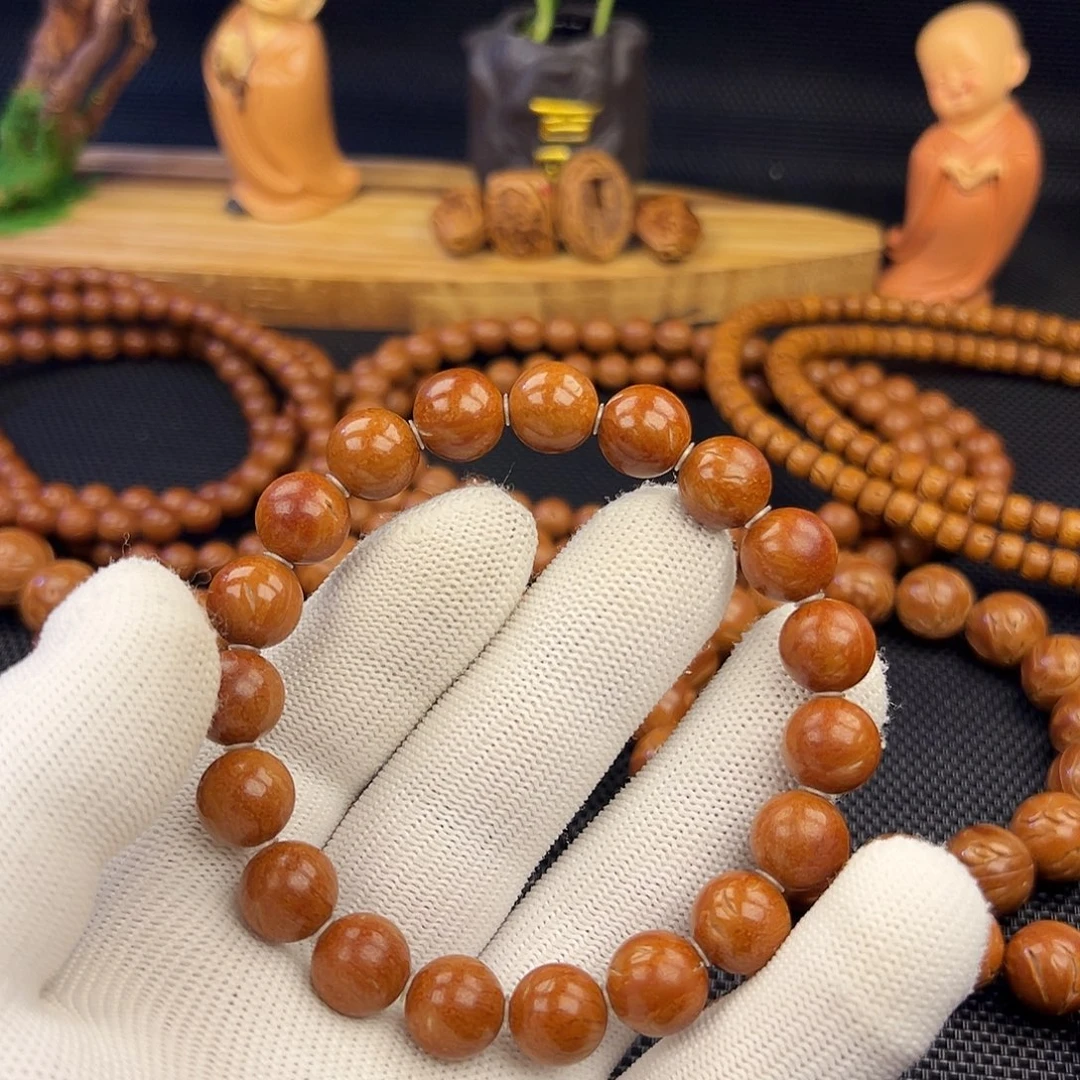 小***焱野生龙纹桃核光珠