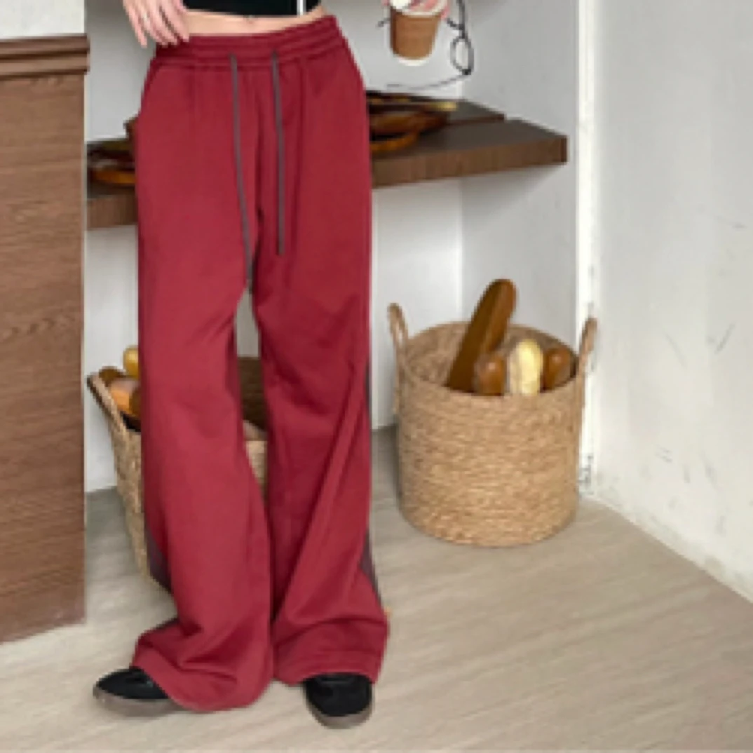 深圳MMOUHUO新款贴标松紧腰裤脚抽绳卫裤