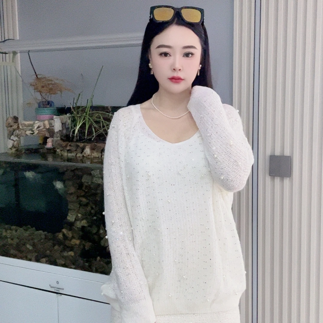 20931-3钻珠重工珍珠烫钻V领长袖针织衫镂空