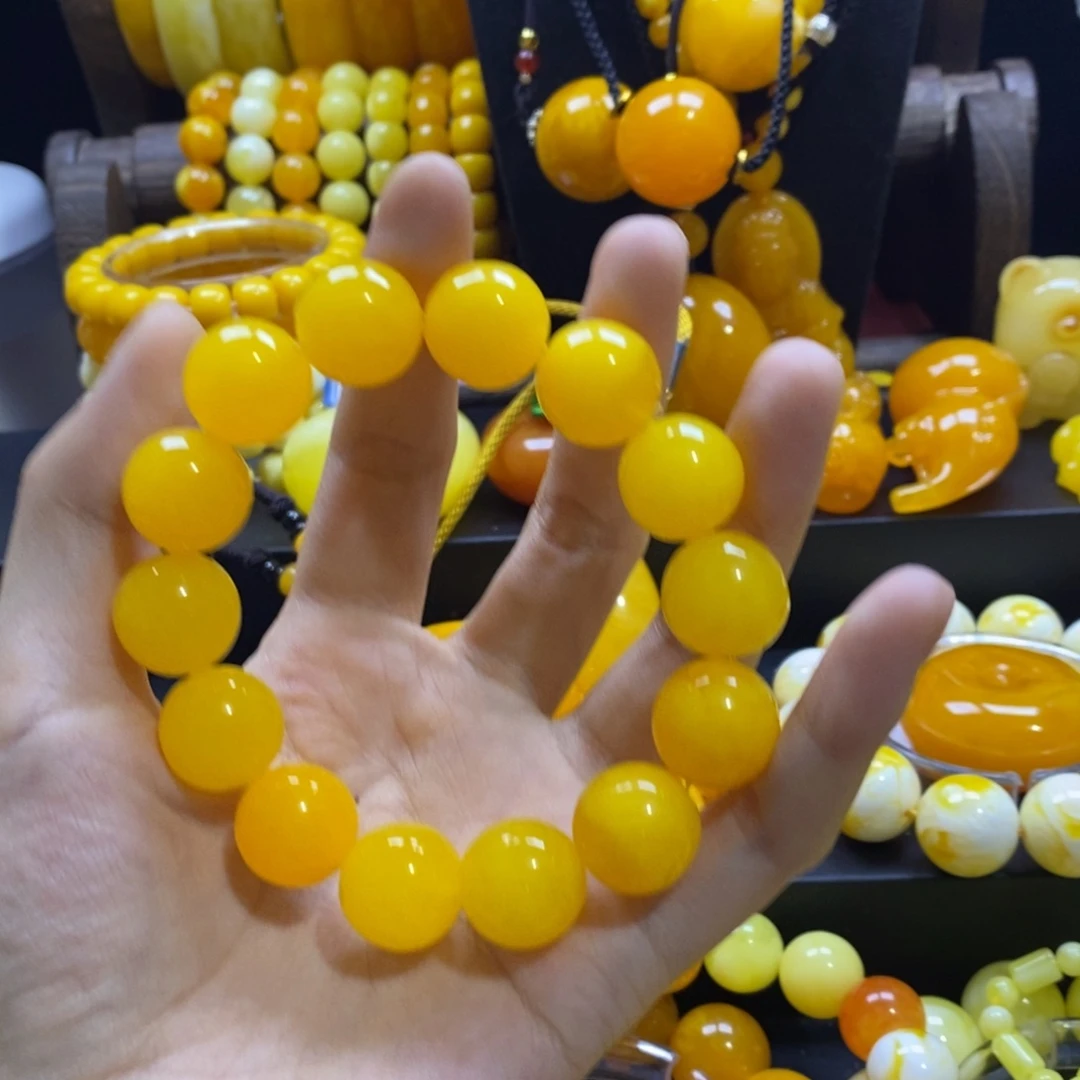 唐***非金属卡16鸡油黄全品手串