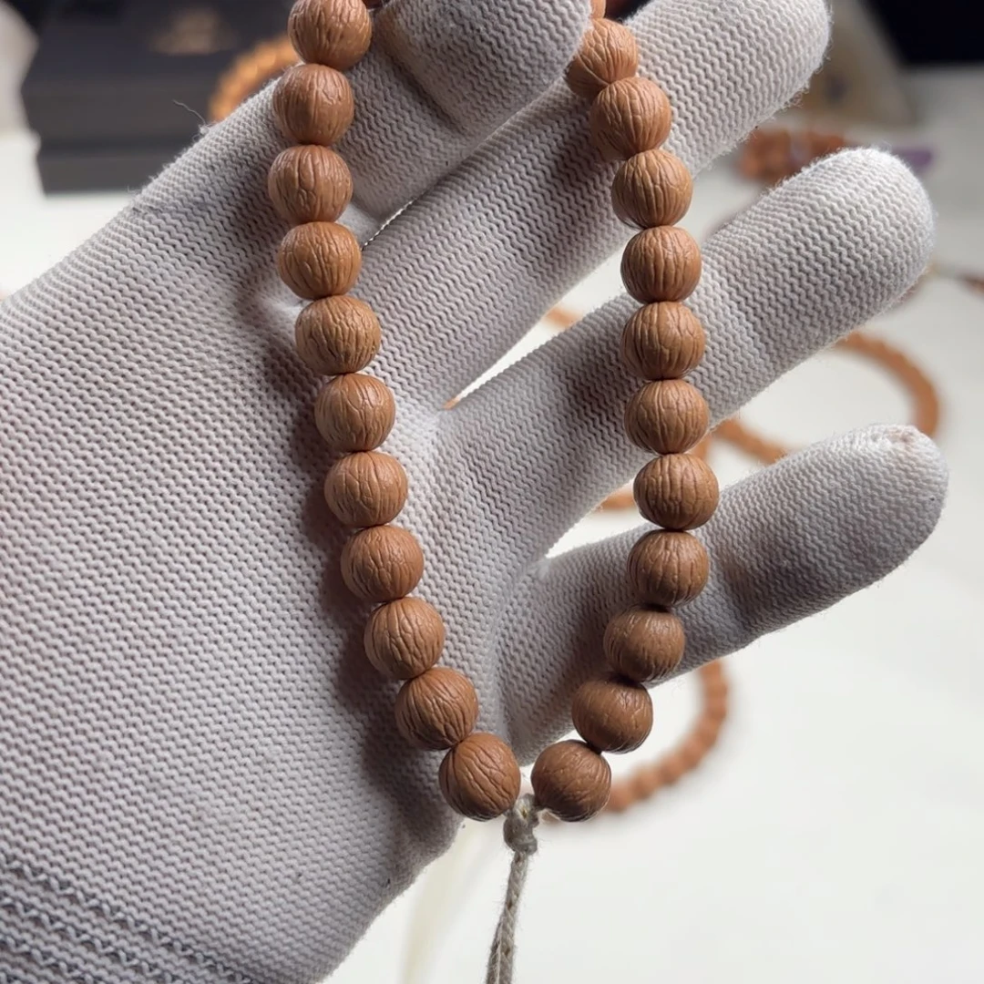 一***包手串猴头核桃凤羽，