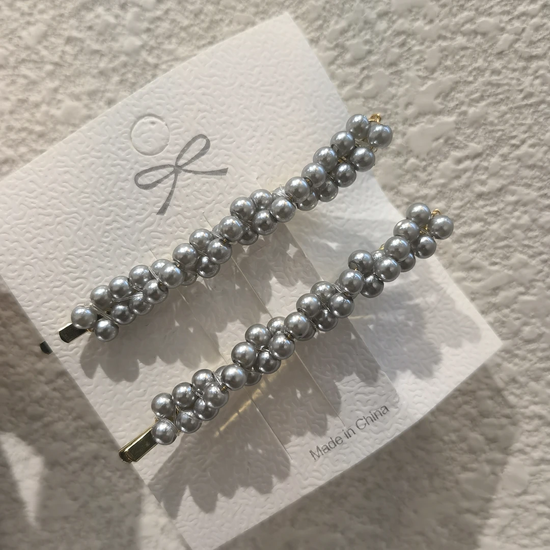 E204灰色手工编织珠边夹一对