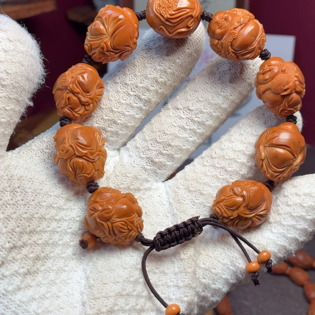 手串橄榄核玉化料八宝弥勒