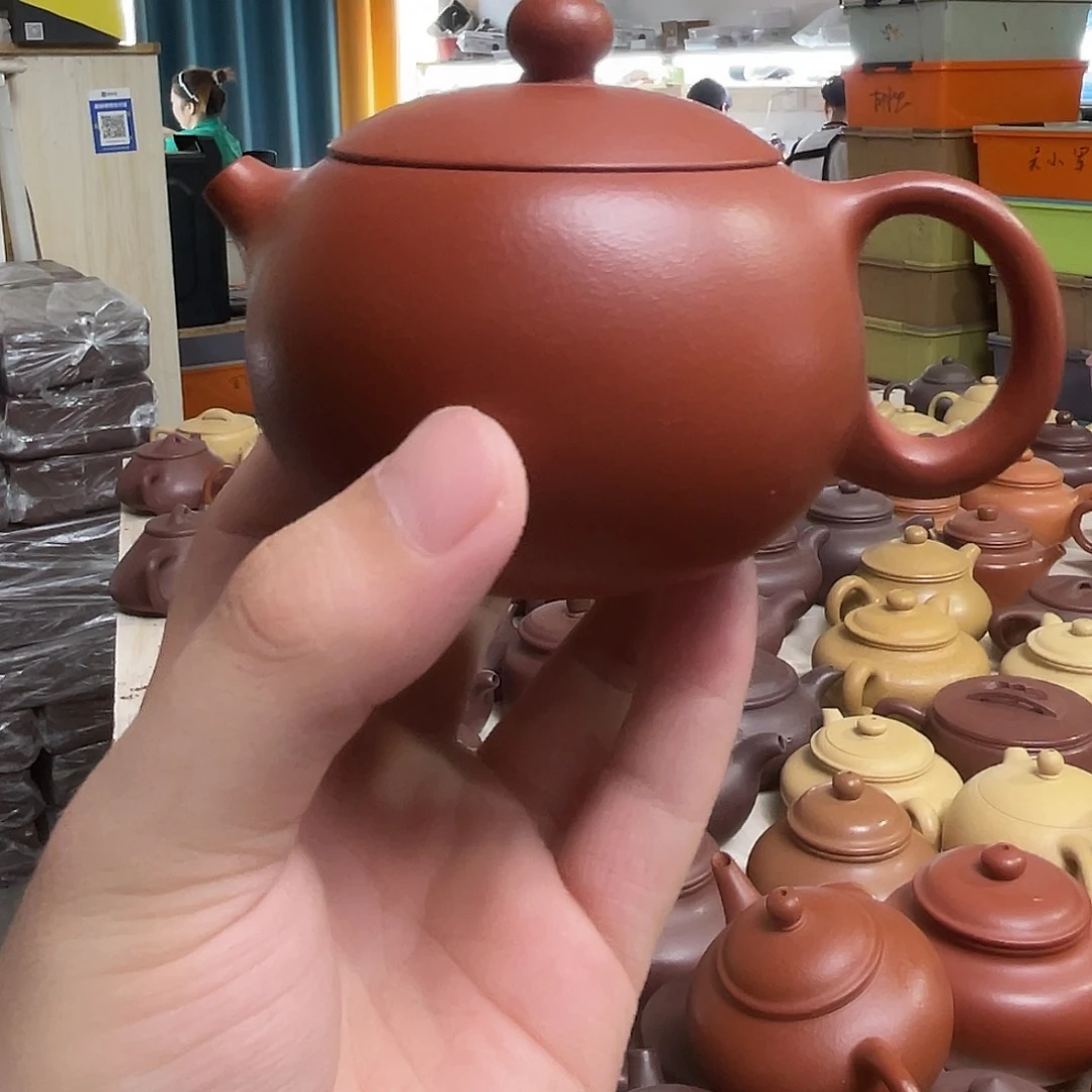 茶壶紫砂西施朱砂。刘。