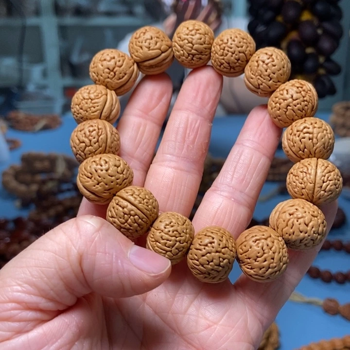 【闪购商品】桃核吊坠虎皮肥脐桃核