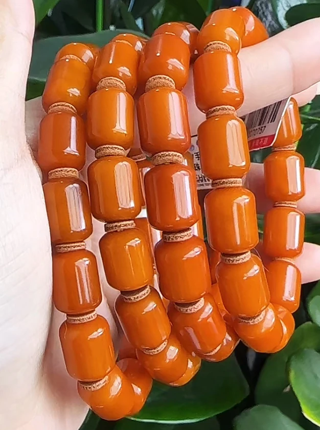【齐福珠宝】XQ0757/10-11mm天然琥珀老蜡桶珠手串（多样性发其一)