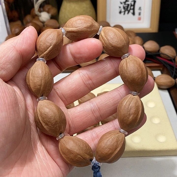 橄榄核手串半**田1.9梅林铁核原皮