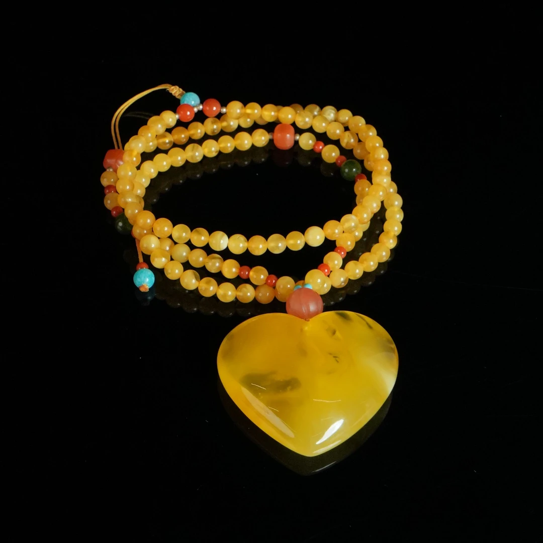 DY-M1947 俄料鸡油黄蜜蜡心形吊坠 26.12g