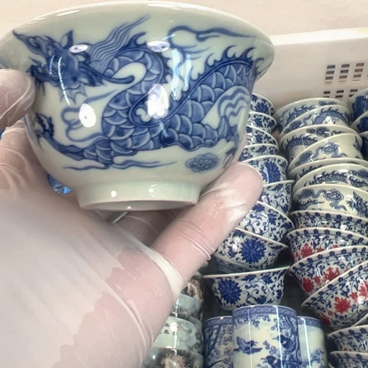 瓷片白青花铠甲龙压手杯主人杯全品
