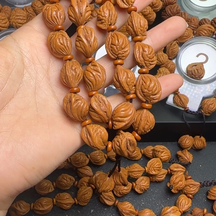 阳***手桃核手串龙纹桃核