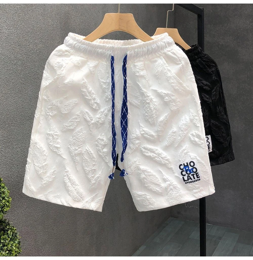 男士短裤提花百搭潮牌时尚休闲五分裤夏季男士宽松直筒帅气沙滩裤