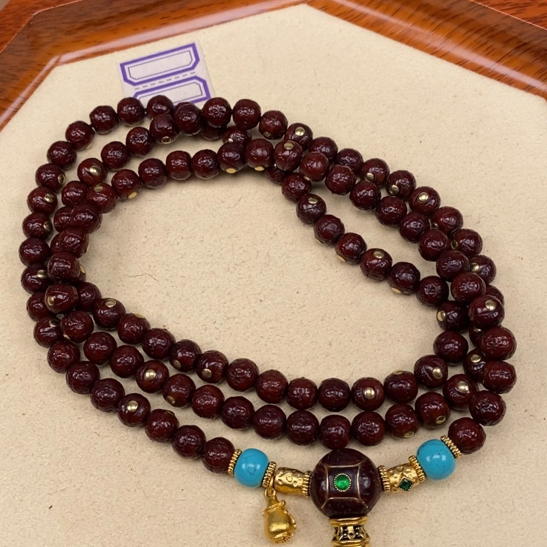 金****凤眼菩提吊坠凤眼