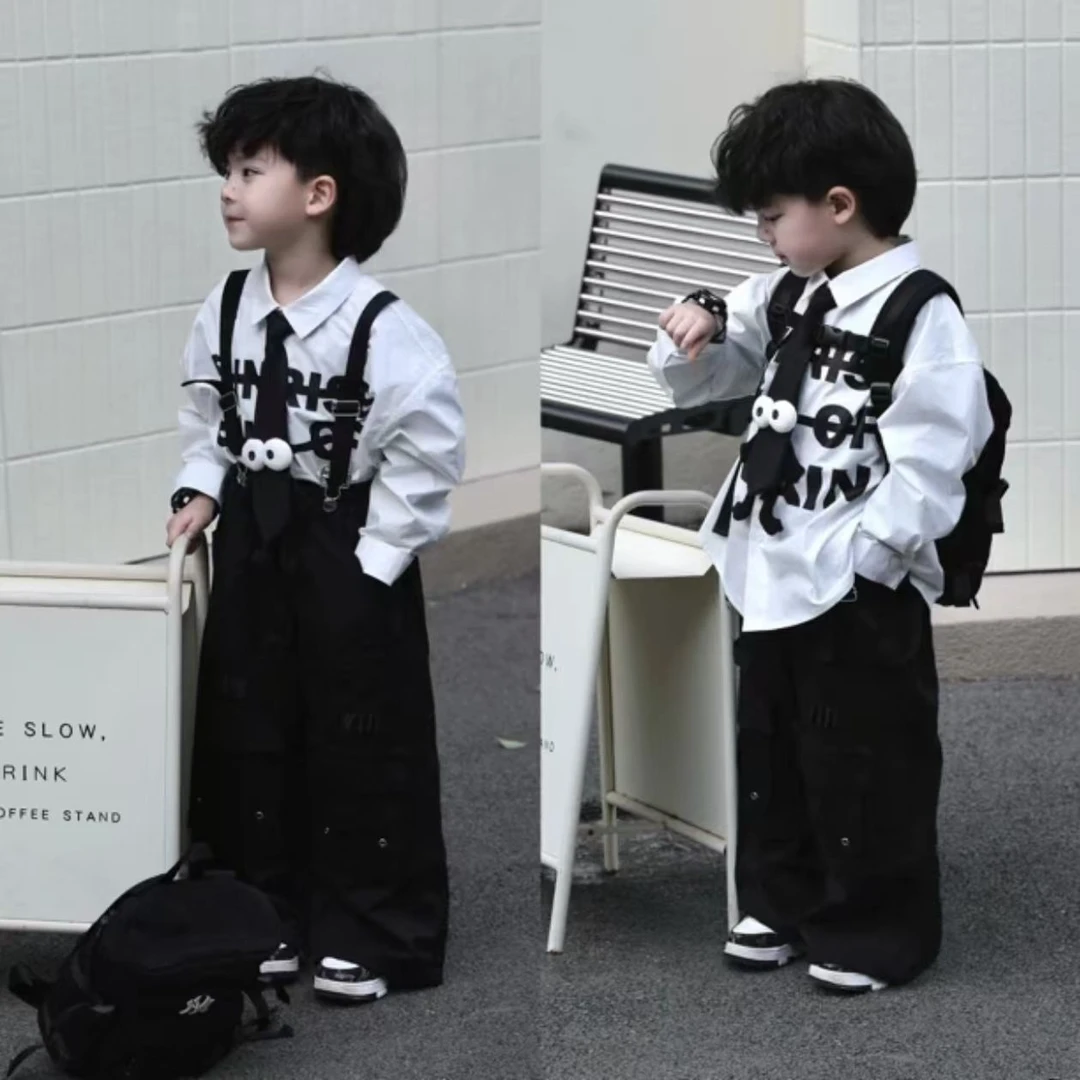 儿童春秋套装2025新款印花大眼睛可爱领带衬衫工装背带裤三件套潮