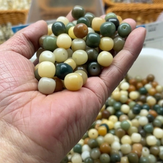 白玉菩提吊坠瑕疵11多宝不规则桶珠200颗