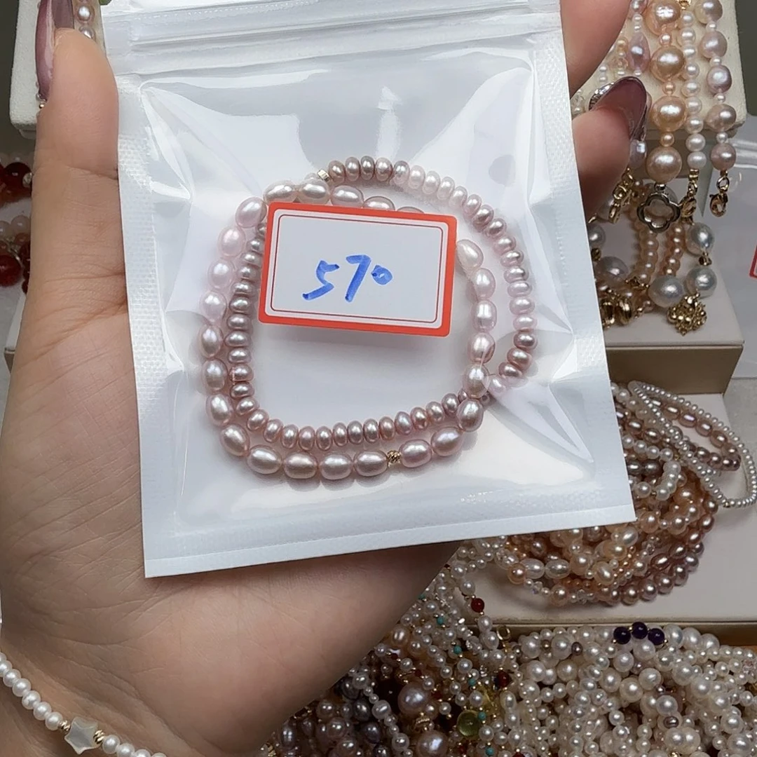 ****.淡水珍珠手绳钛钢