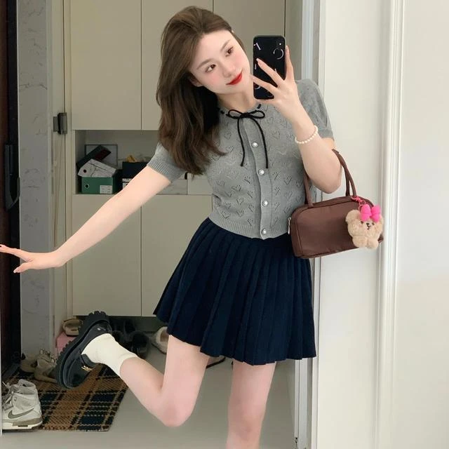 小香风夏季镂空短袖针织开衫女小众设计感泡泡袖蝴蝶结短款薄上衣