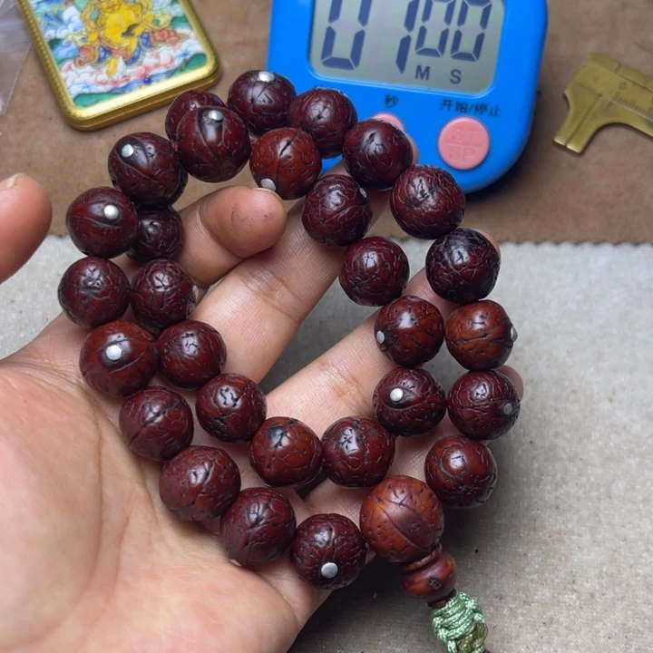 泥塑飞*念珠……….