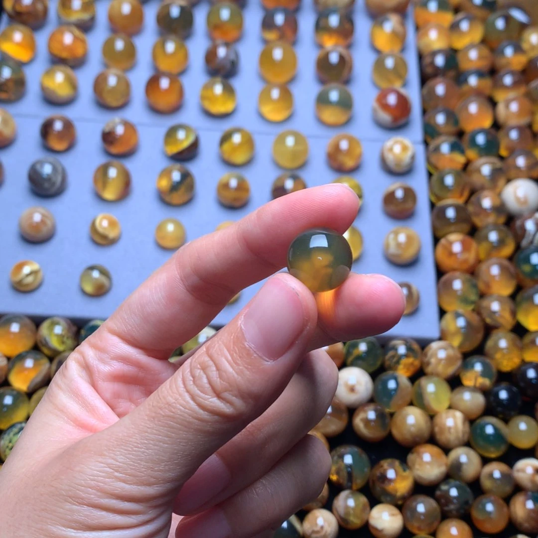 叁***喜未镶嵌琥珀珠宝奇石