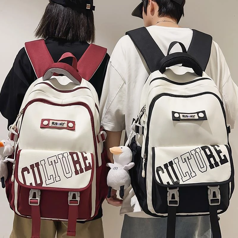 儿童书包男生初中生高中女生大学生小学生大容量多层轻便双肩背包