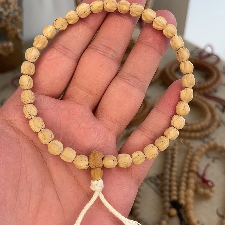 吊坠柏香籽/百香籽深坑莲花奶油皮玉化料