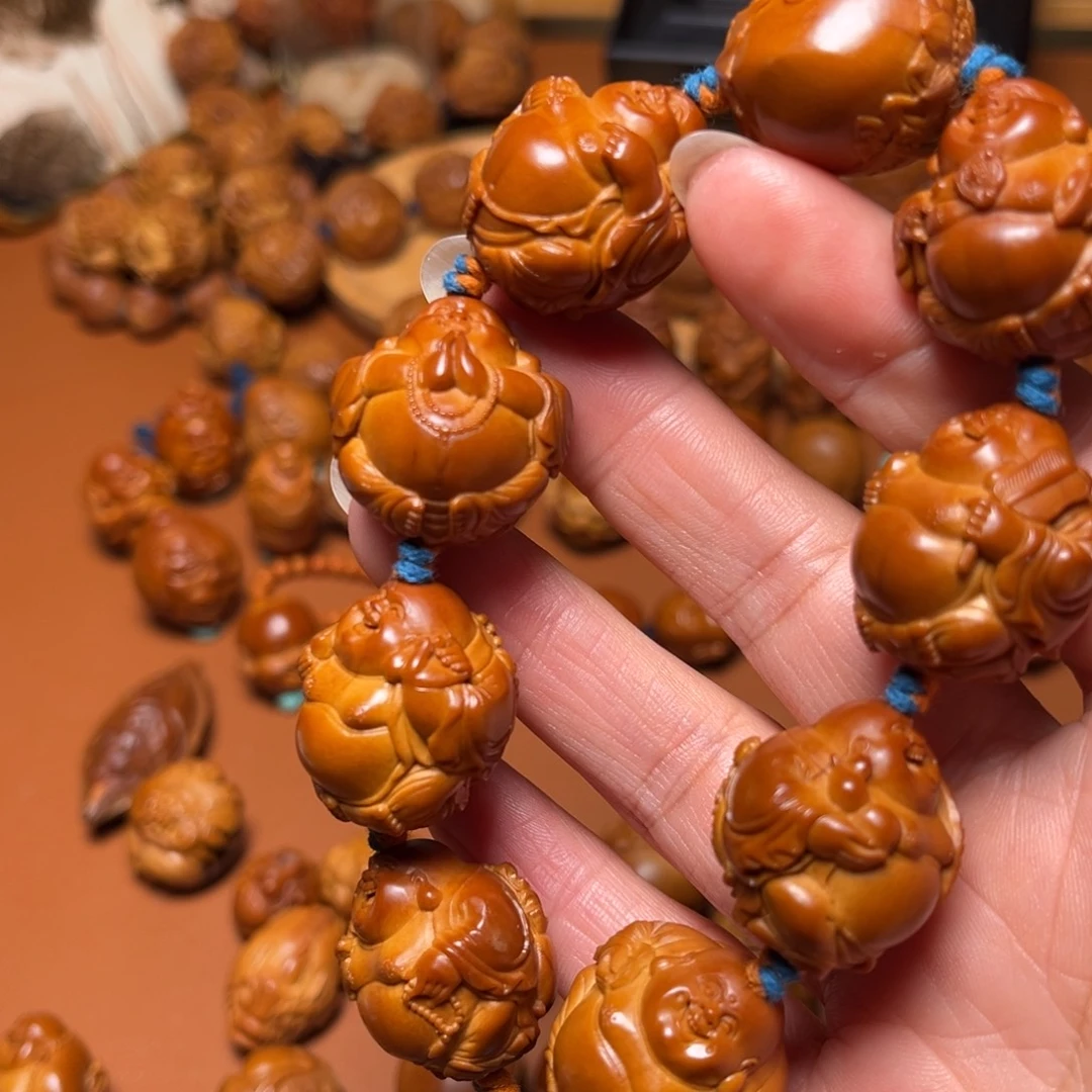 磊***子手串/手链橄榄核聚宝盆米勒