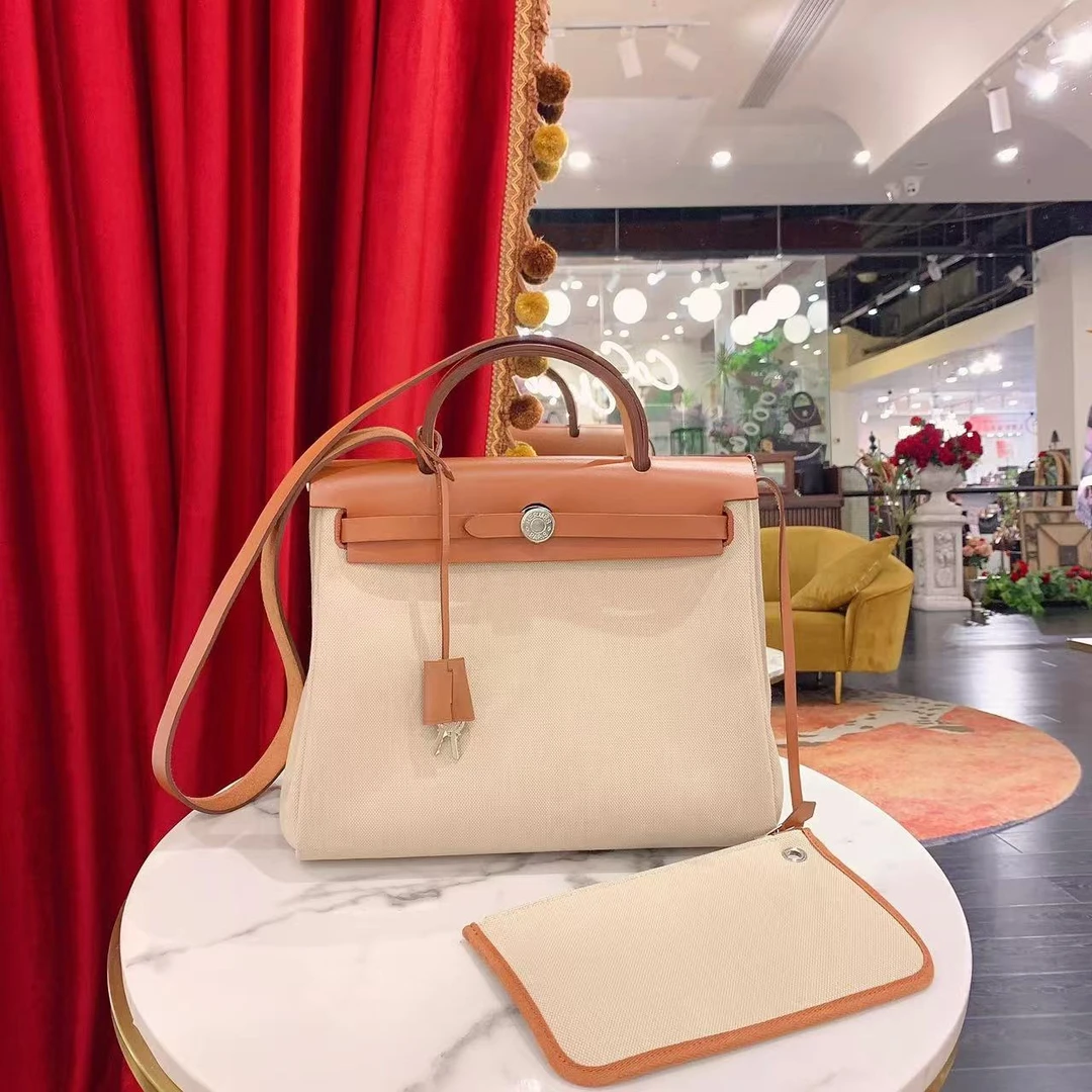 95新 Hermes/爱马仕 herbag31水泥灰银扣帆布拼皮/88406559